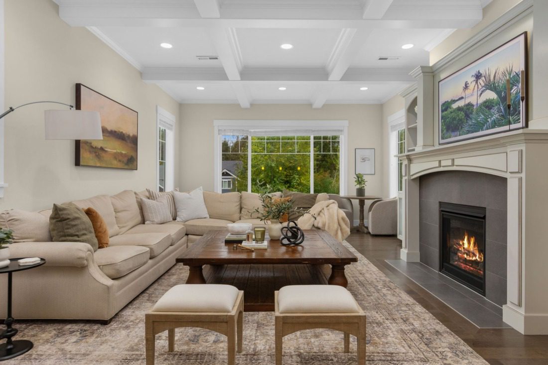 spacious living room in gig harbor with fireplace and large windows